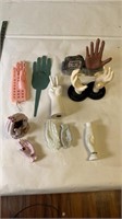 Assortment of plastic and ceramic hands
