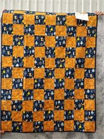 pieced crib quilt (orange and navy)