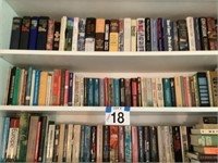 3 shelf units of books