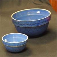 Two blue stoneware mixing bowls: one