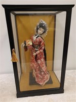 Oriental doll in showcase
