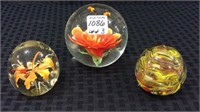 Group of 3 Glass Paperweights Including Orange