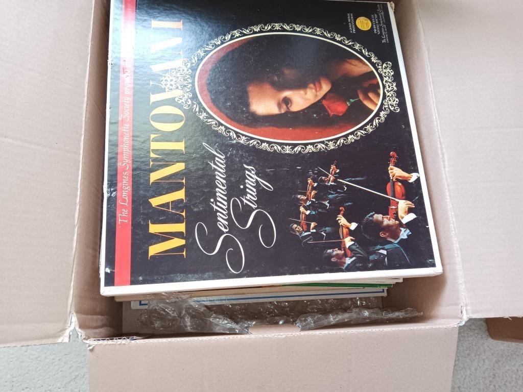 Box of record albums.