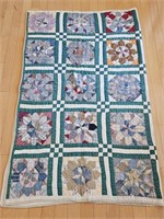 Hand Stiched Flower Quilt is 63 X 80in