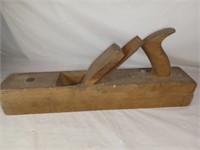 F5) Antique wood plane.