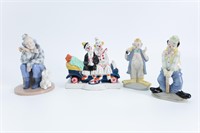 Collection of four porcelain clown figures