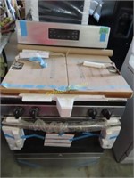 New GE stainless gas stove