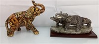 2 elephant figurines ceramic and resin