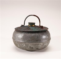 Pot with a tin lid