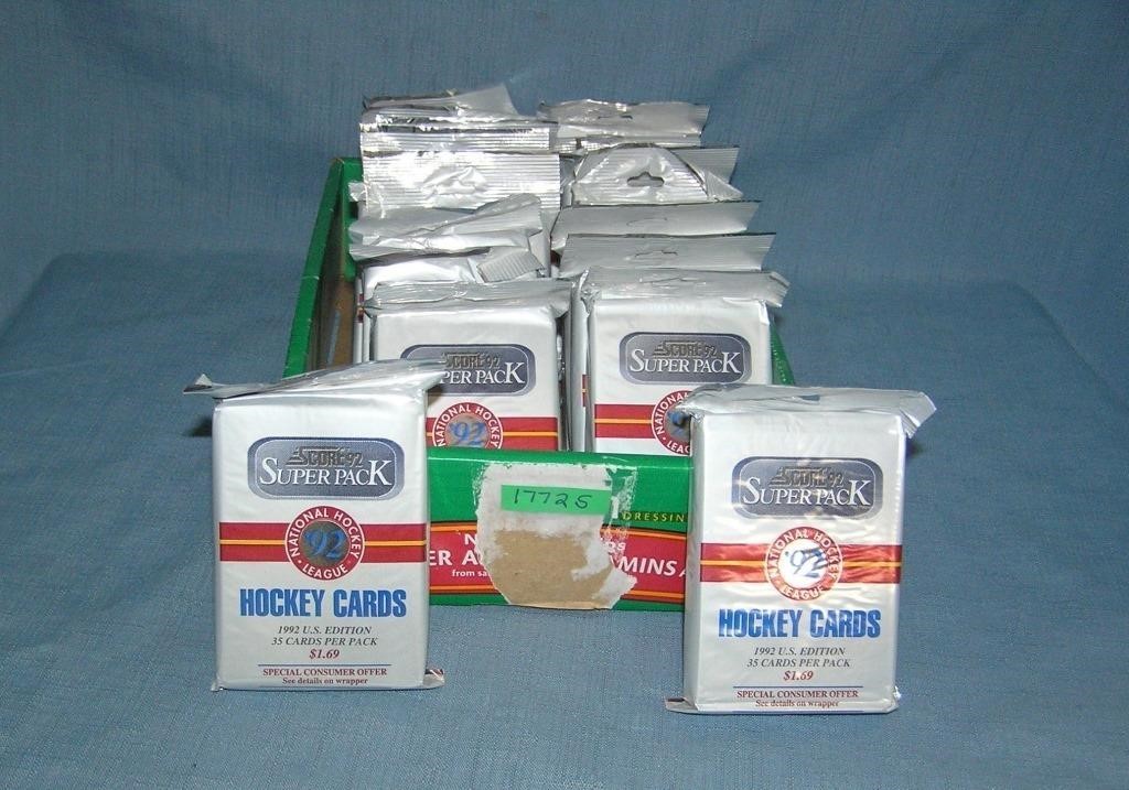 Box full of unopened hockey card packs