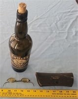 Hunters whiskey bottle + yellow shooters glasses