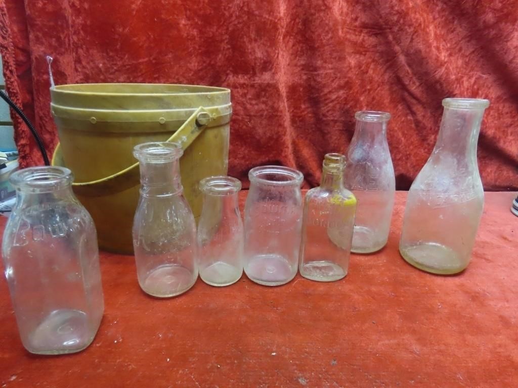 Glass bottles assorted w/wood bucket.