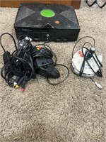 Xbox with controllers. Unknown working condition