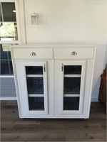 Two drawer two-door cabinet with two shelves on