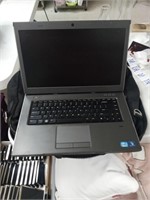 Dell Vostro laptop and laptop bag.  All cords