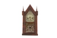 Steeple clock in wood case