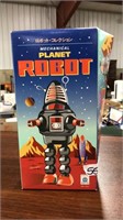 PLANET ROBOT RED WIND UP MECHANICAL TOY