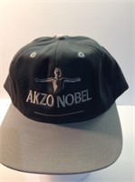 Akzo Nobel Yep adjust a football cap appears to