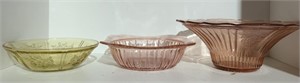 Pink and yellow depression glass bowls