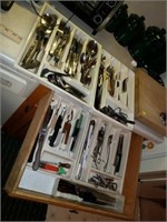 Entire contents of kitchen drawer utensils