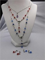 3 silvertone necklaces: w/ blue - w/ red - w/