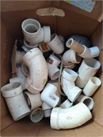 Box of assorted PVC fittings and electrical