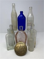 Vintage Bottles and 7up Sidewalk Marker