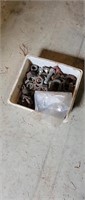 Container of bolts and misc
