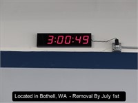 WALL-MOUNTED DIGITAL CLOCK (APPROX 14'H, BUYER IS