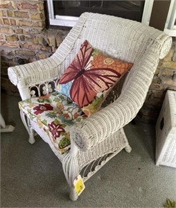 White Wicker Patio Chair with Floral Cushion and