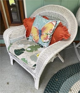 White Wicker Patio Chair with Floral Cushion and