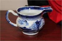 A Chinese Blue and White Export Pitcher