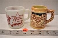 2 small collector mugs