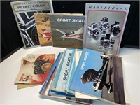 Vintage camera and aviation catalogues and