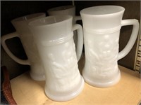 Lot of 4 matching white milk glass beer steins