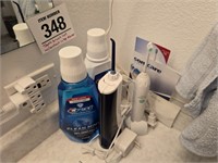 Oral care lot incl. electric toothbrush& waterpick
