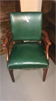 Solid wood chair  w/ green upholstery. Great
