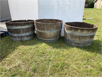 3 wooden 1/2 barrel planters. 28” across