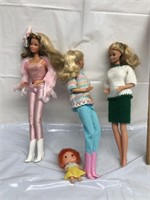 Group of Barbie dolls