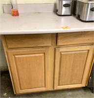 Cabinet with upper laminate counter top