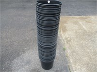 Large Stack of Black Plastic Flower Pots