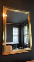 Large brass framed mirror