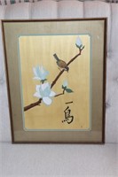 Chinese style picture of a bird on a branch with