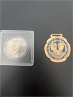 JFK half dollar and State Fair medallion