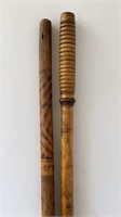 Pair Of Thin Canes One Is Carved