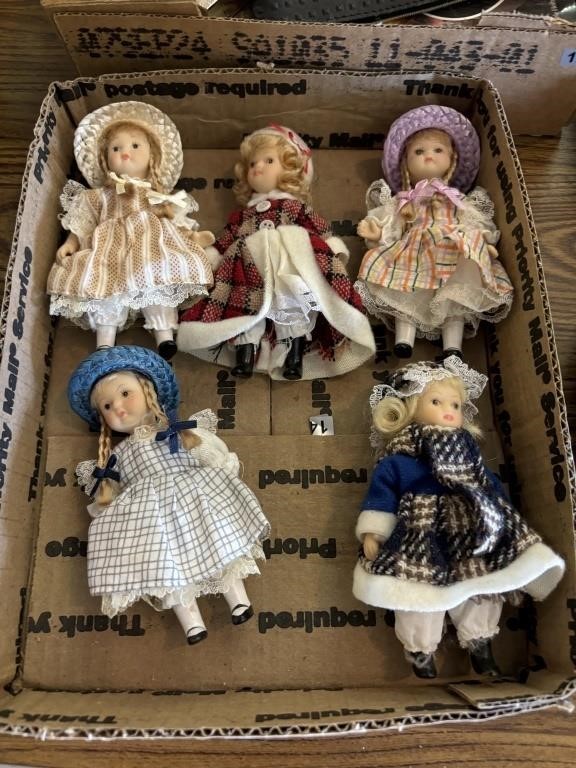 Flat of miniature dolls