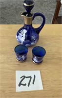 Small handpainted blue jug with shot glasses