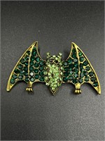 Beautiful green bat brooch