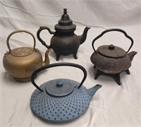 Grouping of Metal Cast Iron Tea Pots