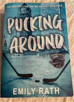 Like new book-Pucking Around by Emily Rath.